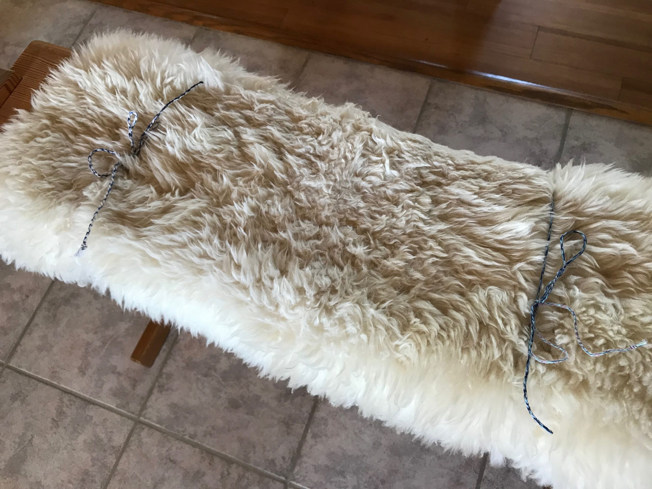 Bench with sheepskin discount throw