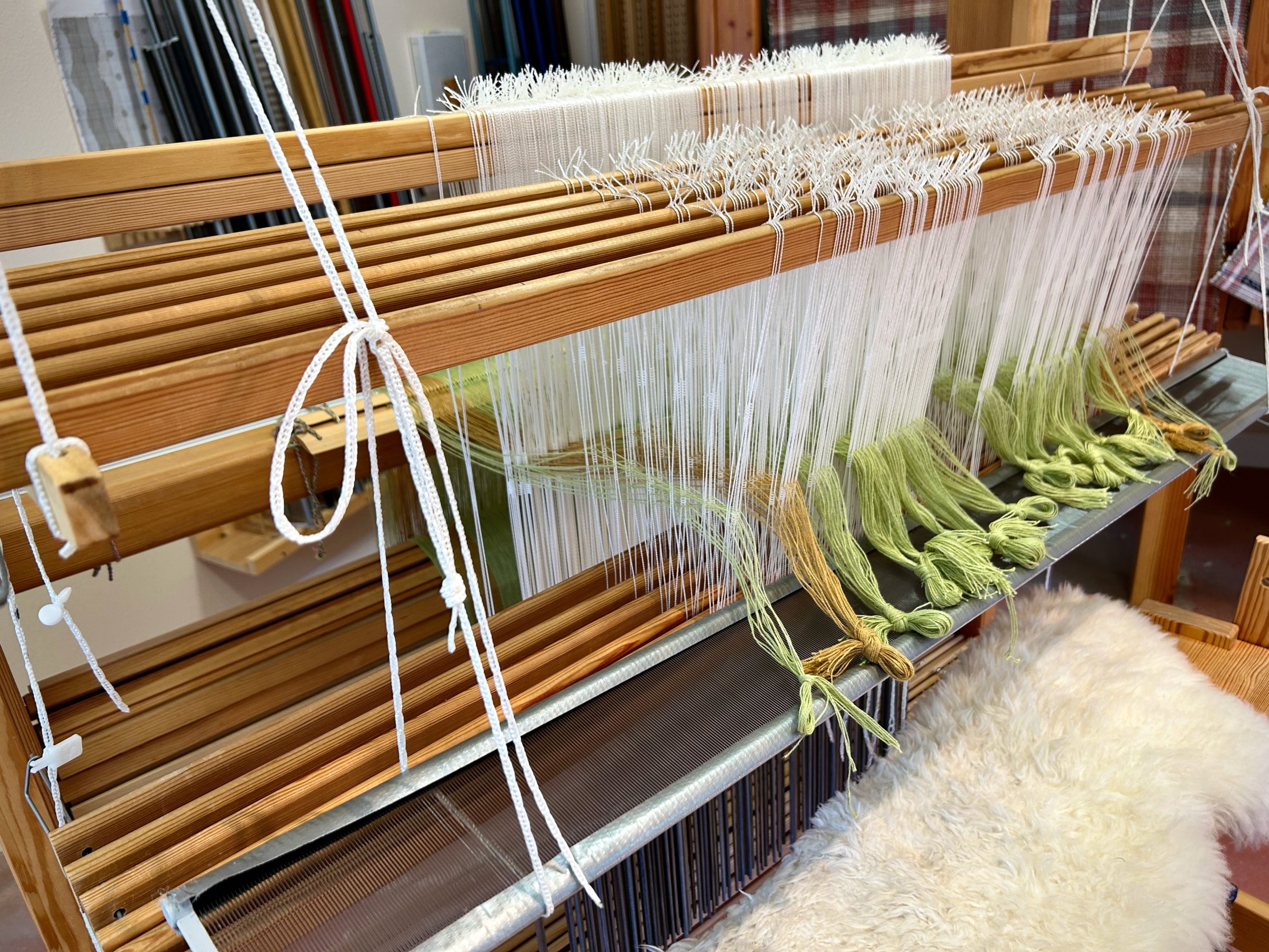 My dad helped me build this awesome inkle loom! I'm new to weaving